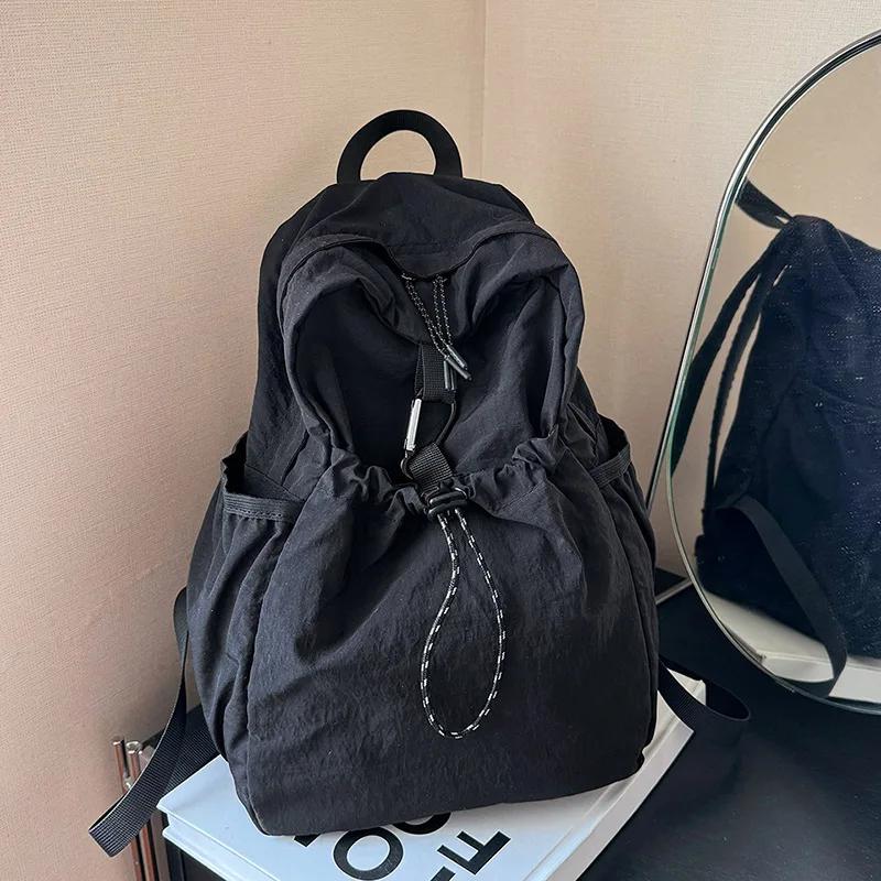 

Школьный рюкзак для ученика средней школы Женский 2024 Новый рюкзак Тканевая сумка Повседневная модная Плиссированный Высококачественный рюкзак Женский чёрный