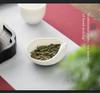 Ling Yi White Porcelain Gongfu Tea Set: Tea Spoon, Tea Measure, Portioning Tray, and Accessories.