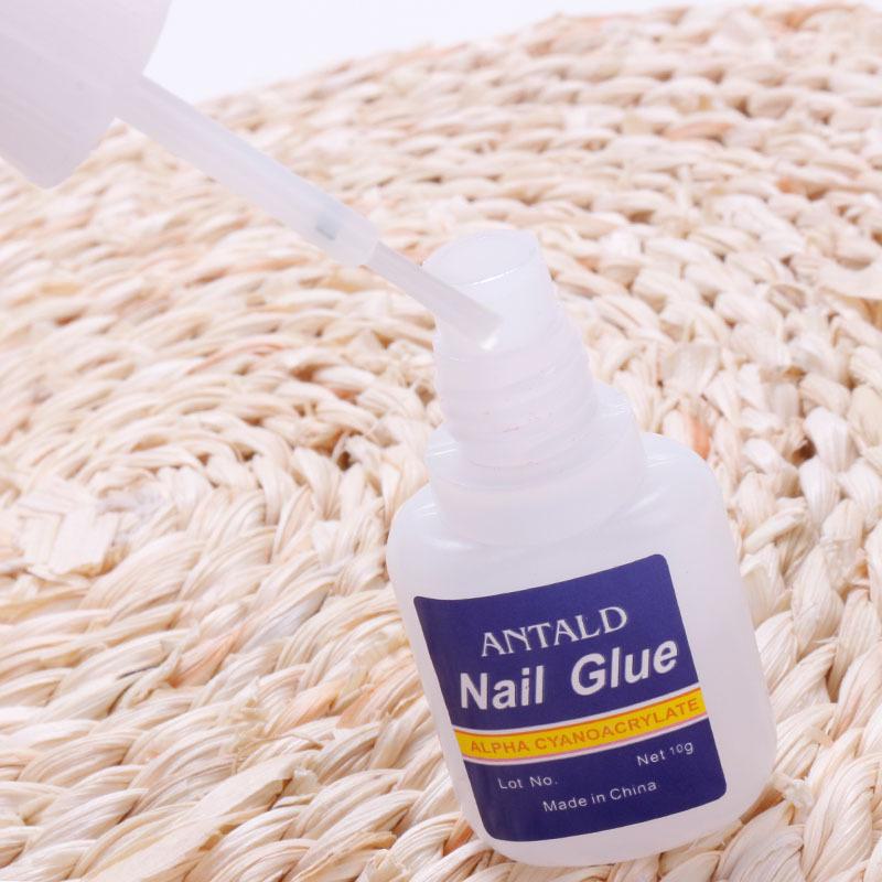 Quick-Dry Nail Glue 10g with Brush Head - Strong Adhesive for Nails and Rhinestones (Blue Bottle)