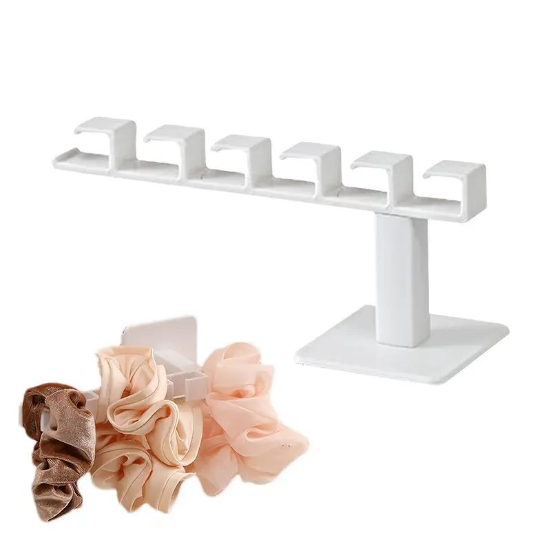 1ks nástěnný nástěnný stojan na klobouky se snadnou instalací - leštěná povrchová úprava, plastový organizér pro ukládání klobouků, čelenek a klíčů se 6 háčky - multifunkční domácí příslušenství