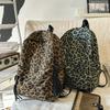Leopard Print Backpack Casual Daily Use Trendy Street Style Lightweight Backpack for Women with Tassel Detail for School Travel and Everyday Outings