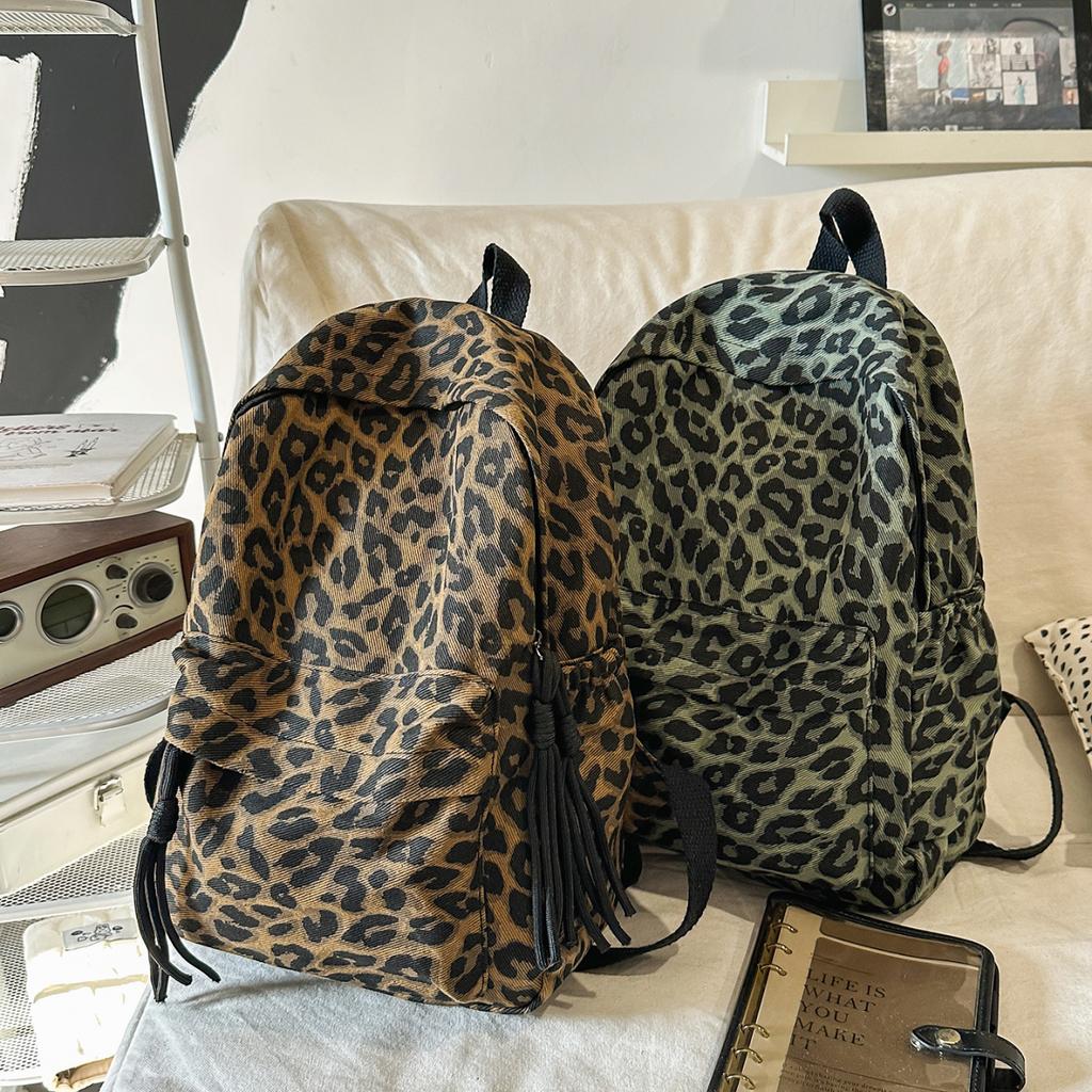 Leopard Print Backpack Casual Daily Use Trendy Street Style Lightweight Backpack for Women with Tassel Detail for School Travel and Everyday Outings