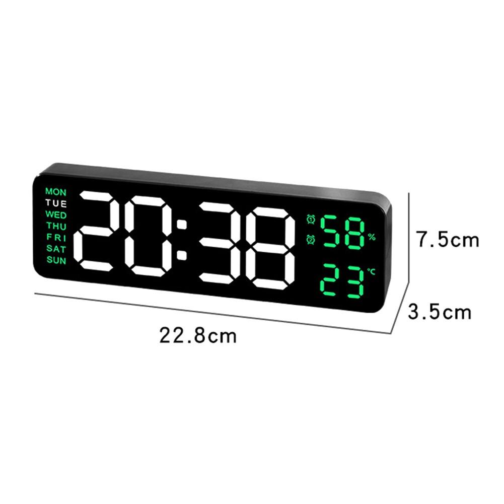 Multifunctional electronic clock that can be hung or stood as an alarm clock