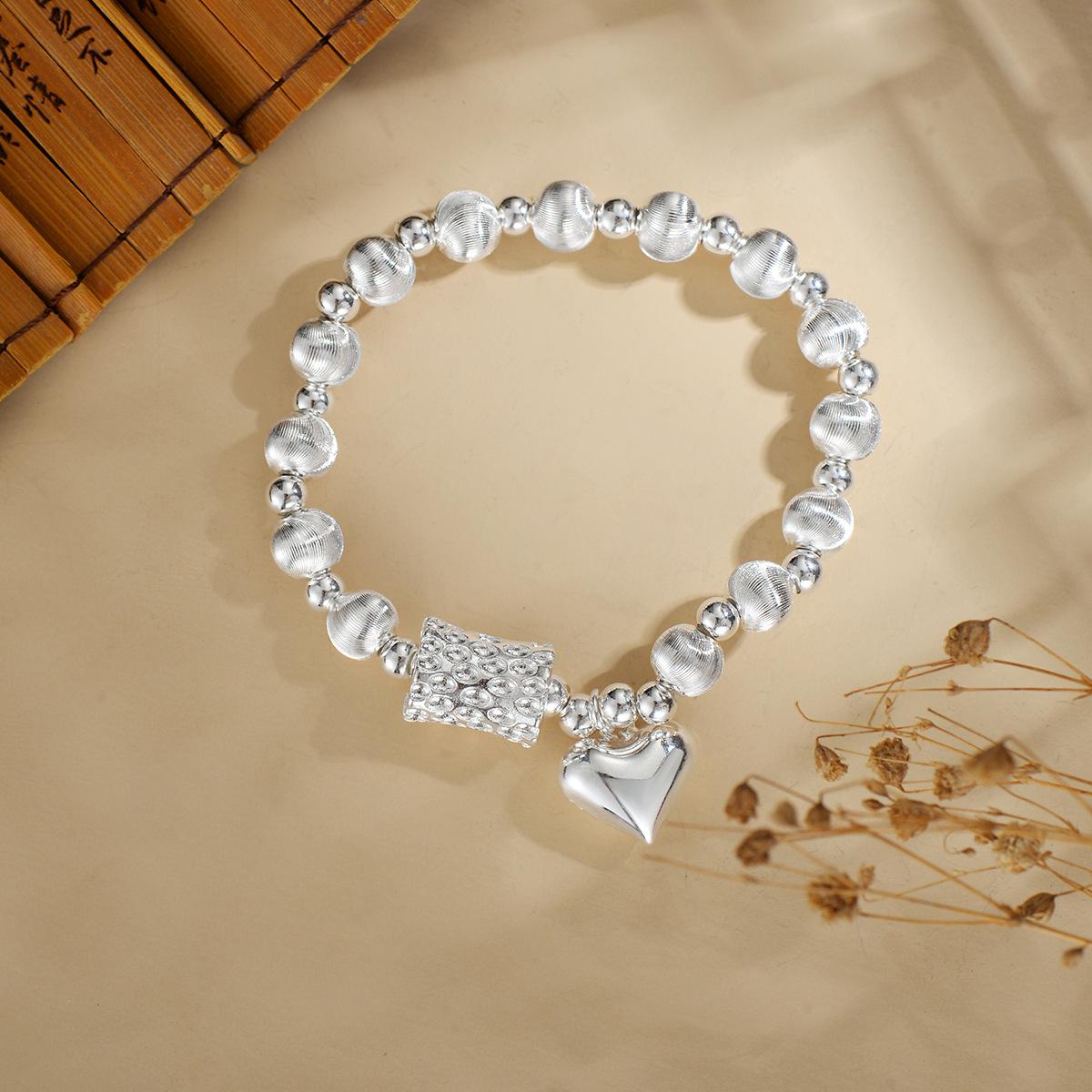 

2025 Cat s Eye Heart Bracelet: Women s Handmade Elastic Beaded Korean Style with Silver Heart Rolo Chain