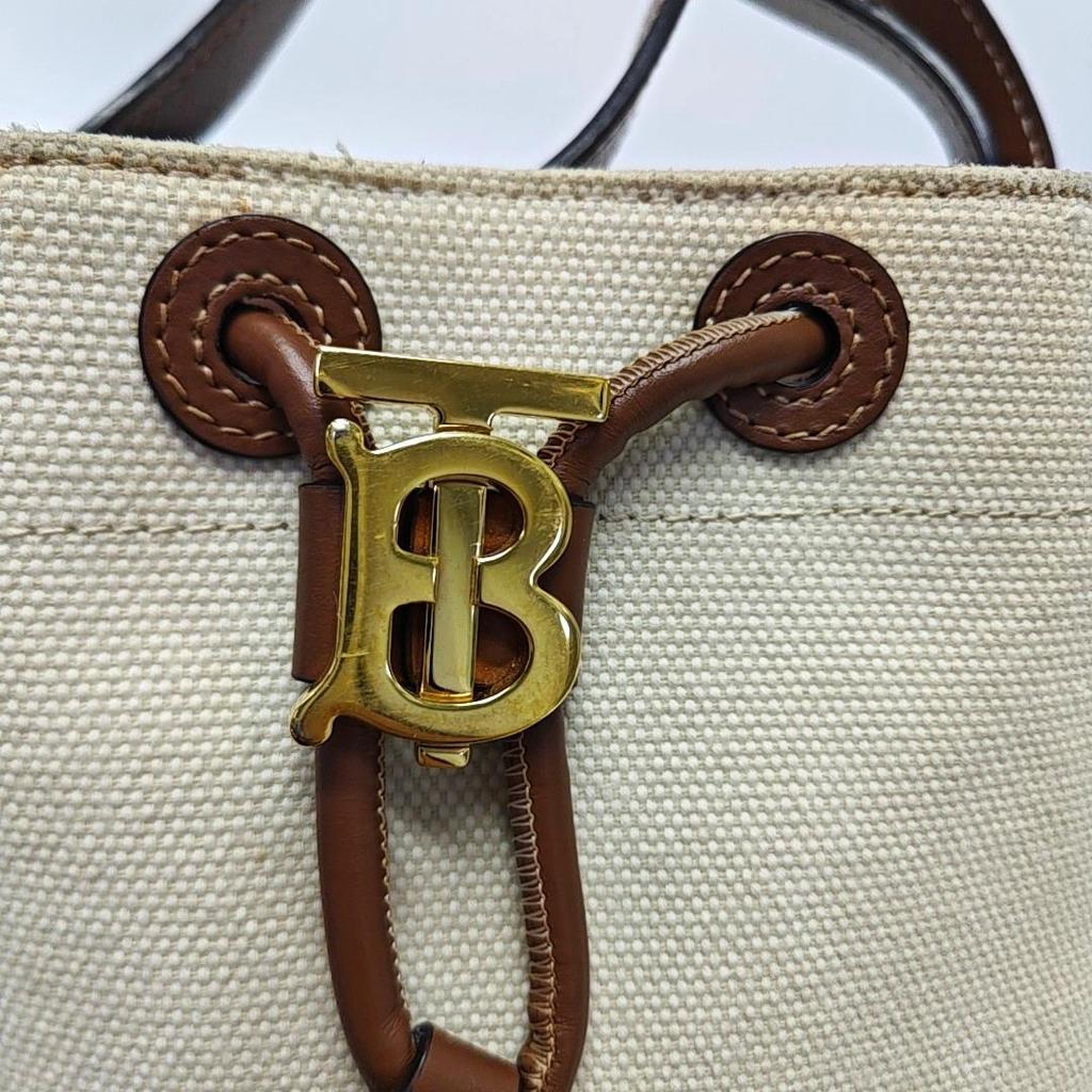 [Pre-Owned] Tb Exclusive Logo Drawstring Closure Leather And Cotton Blend Bucket Bag Mini - Very Good #1RMCGY8
