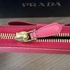 Used PRADA long wallet ribbon round zipper