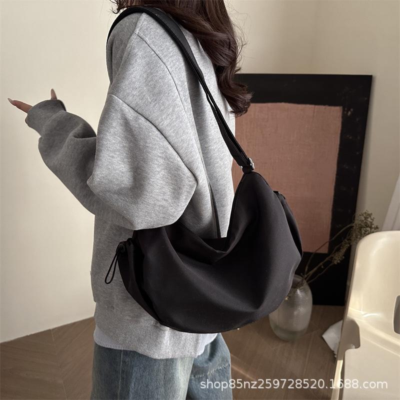 Shoulder bag Large capacity bag Women's tide travel backpack Solid color messenger bag Messenger bag Women's summer student commute