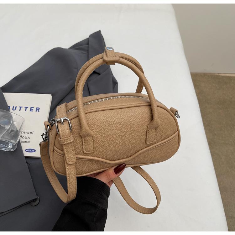 New textured portable bowling bag women's 2025 spring fashion simple shoulder messenger bag popular small square bag