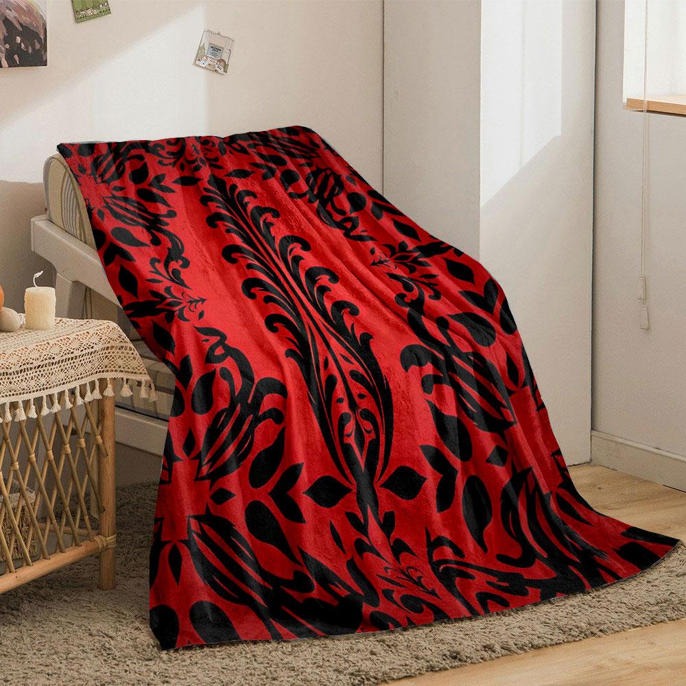Kräftige schwarze Blumenmotive auf rotem Hintergrund mit symmetrischem Design. Decke für alle Jahreszeiten Mittagspause Überwurf Geschenk