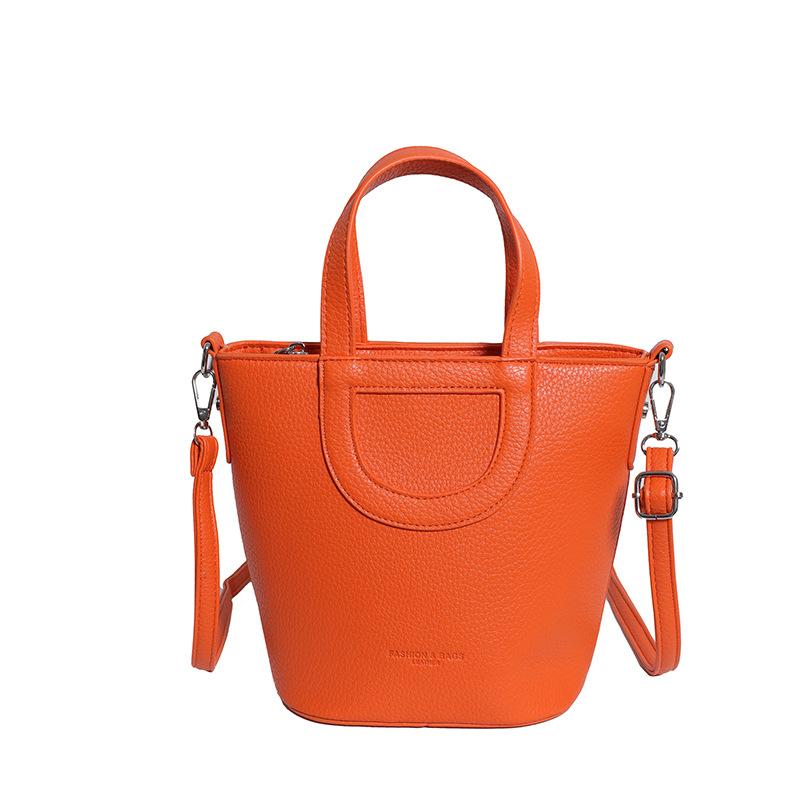 

Большая вместимость, ощущение моделирования, мягкая и прочная, модная, изысканная, новая, легкая роскошь, для поездок на работу, на плечо через плечо, ручная, сумка-ведро оранжевый