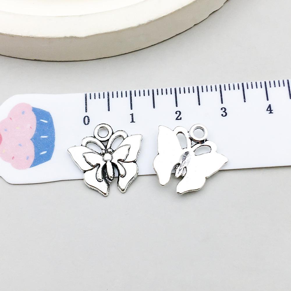 Set di 100 Ciondoli Gatto Farfalla Luna Argento Antico per Braccialetti e Collane Fai da Te