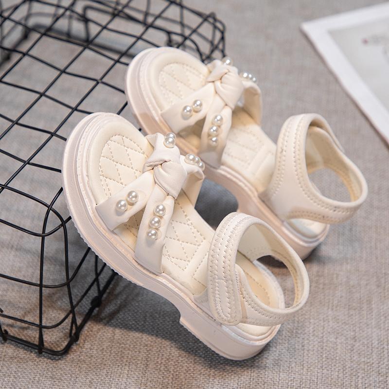 Sandalias cruzadas para niñas pequeñas, sandalias de princesa con perlas, antideslizantes, de moda, para playa, de verano, todas a juego, talla 26-37
