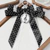 Trendy Musical Note Keyring Key Holder Featuring Piano Keys And Delicate Bowknot Perfect For Music Enthusiasts