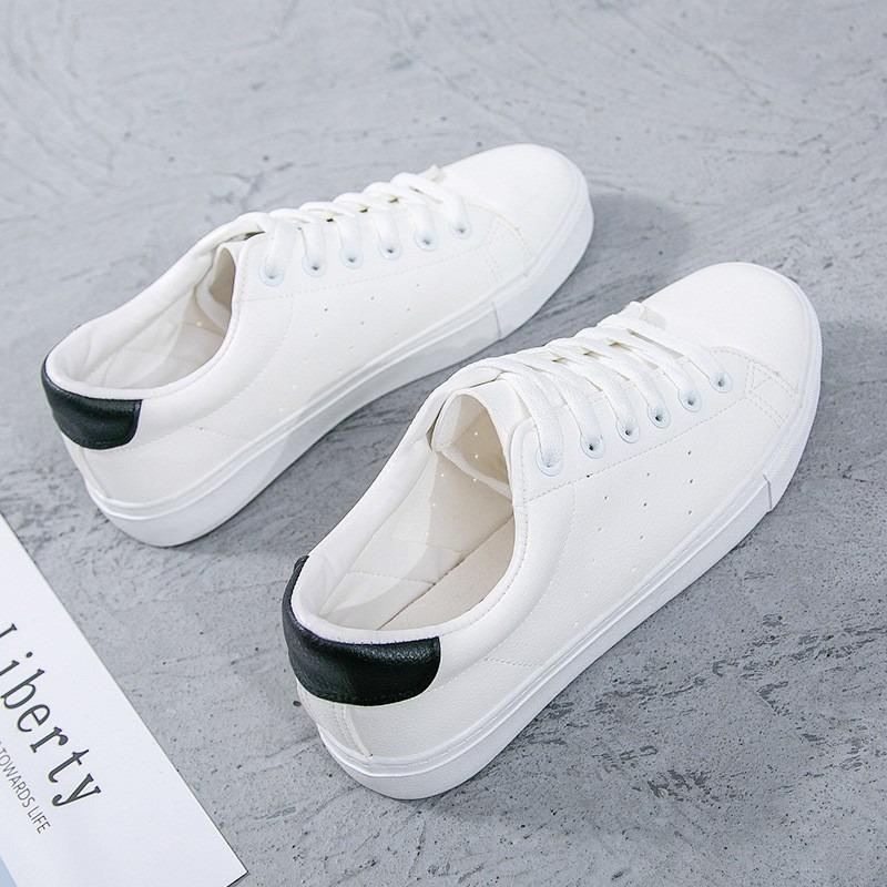 Scarpe bianche in pelle da donna primavera versatili scarpe bianche nuove traspiranti leggere suola morbida bianco puro scarpe da ginnastica da studente scarpe da uomo