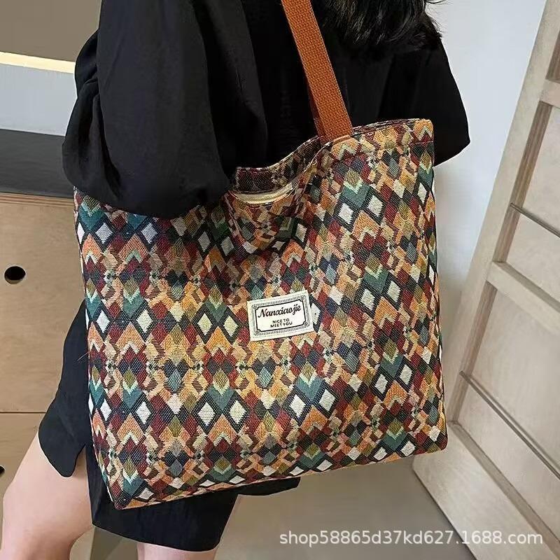 Tote Bag Women's Ins 2026 Autumn and Winter New Fashion Commuter Large Capacity Canvas Bag Women's One-shoulder Crossbody Handbag