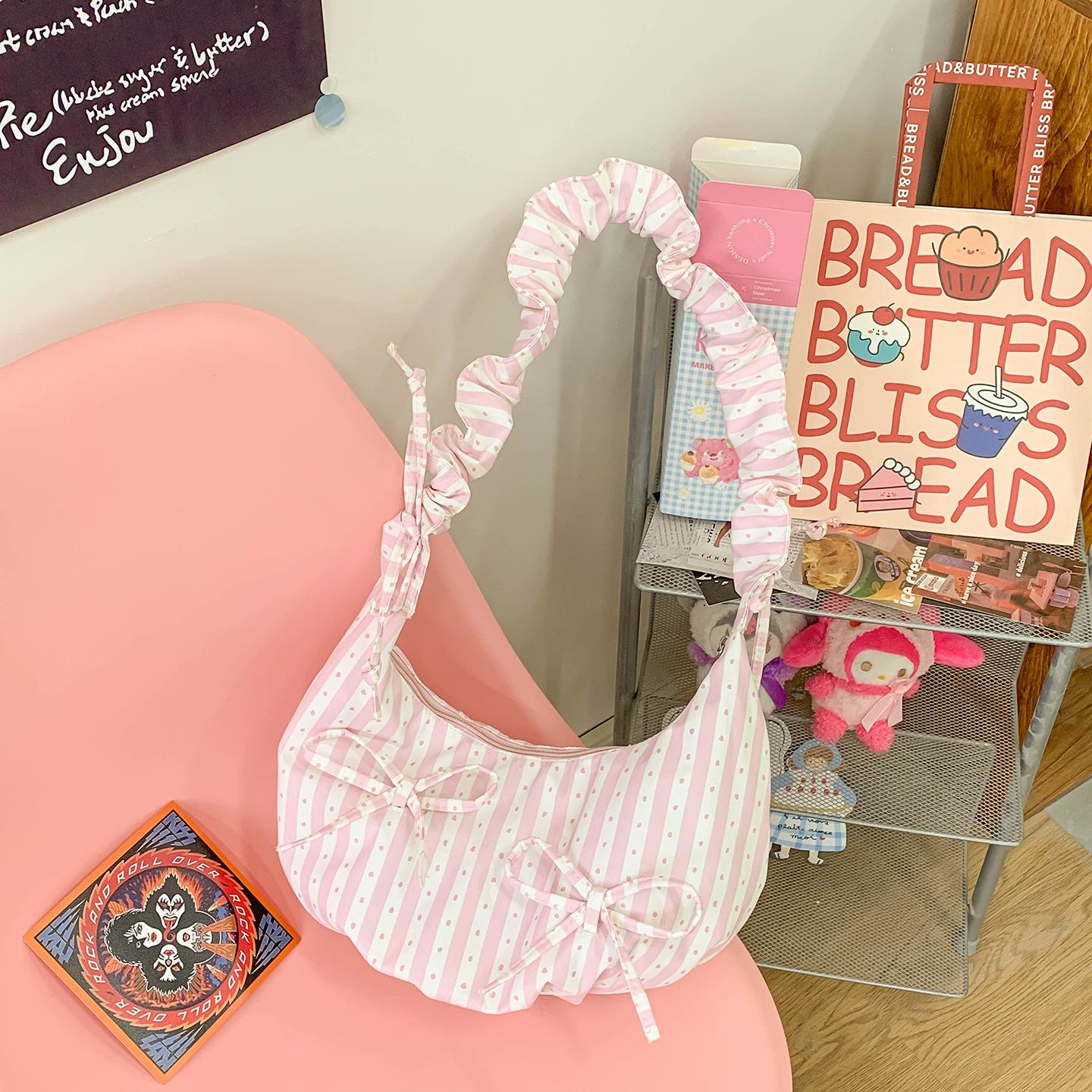 

Striped bag women s large-capacity new summer leisure niche one-shoulder crossbody pleated commuter dumpling bag розовый