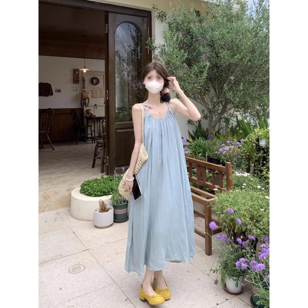 Seaside vacation style blue suspender dress women's spring new loose backless strap A-word long dress ins trend