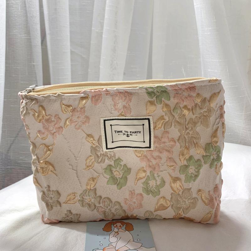 

Women s clutch bag cosmetic bag cloth bag handbag bubble cloth three-dimensional jacquard cosmetics bag рожевий