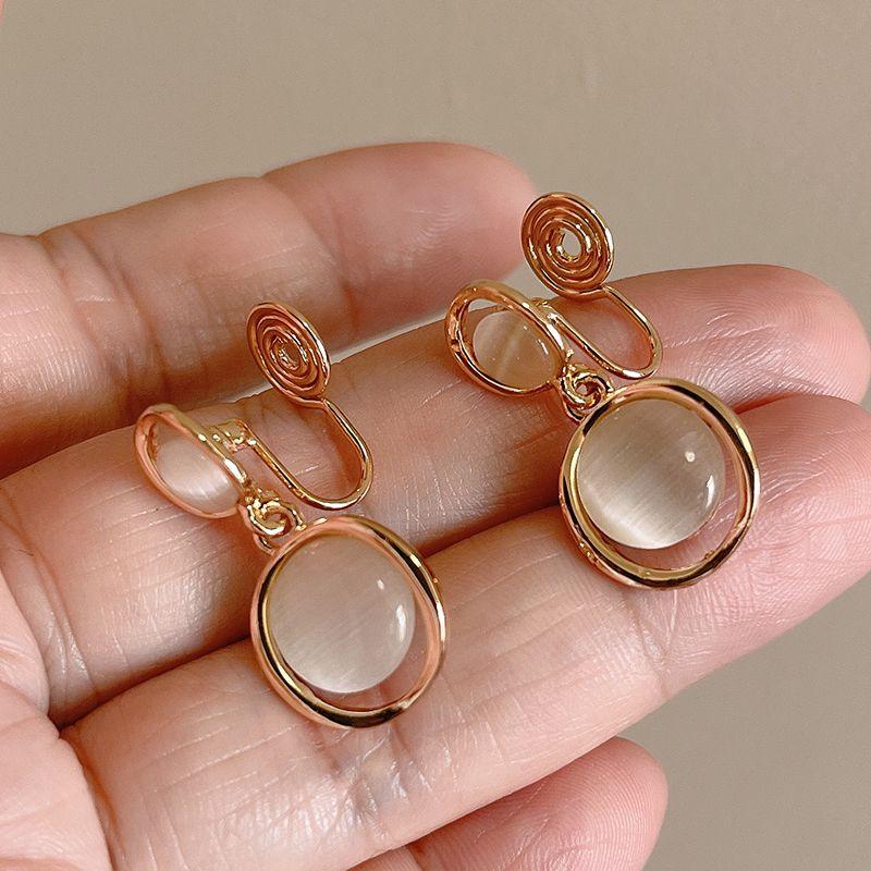 

Apricot Geometric Circle Mosquito Coil Ear Clip Fancy Fall and Winter All-Match Ear Studs Earrings Ornament Mosquito coil ear clip a pair