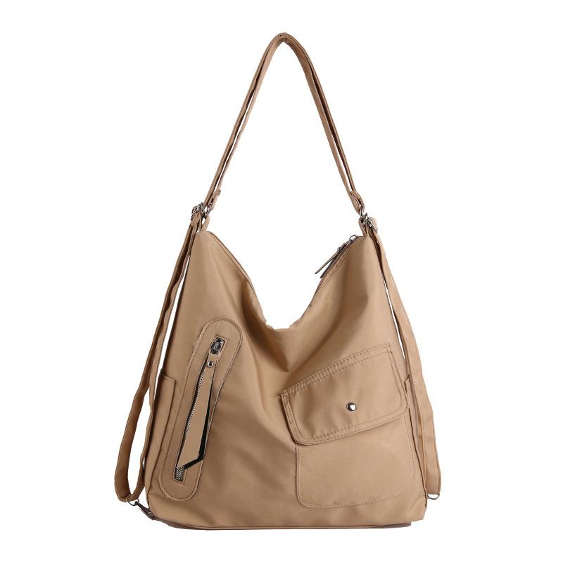 Casual backpack New versatile largecapacity threepurpose shoulder messenger bag Student tote bag