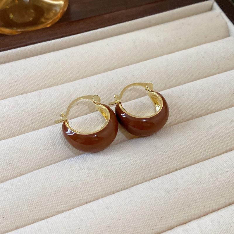 Zirkon Perlmutt Sunburst Ohrklemmen: Elegante, vielseitige Ohrringe für Frauen.