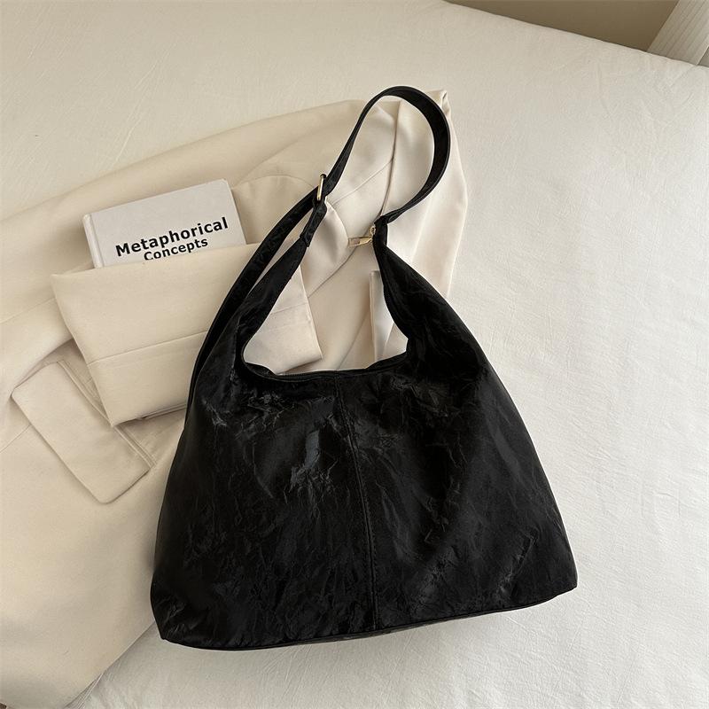 

Женская сумка 2025 Новая Высокая ценность Мода Легкая роскошь Легкая роскошь Текстурированная сумка На плечо Кроссбоди Сумка-тоут чёрный