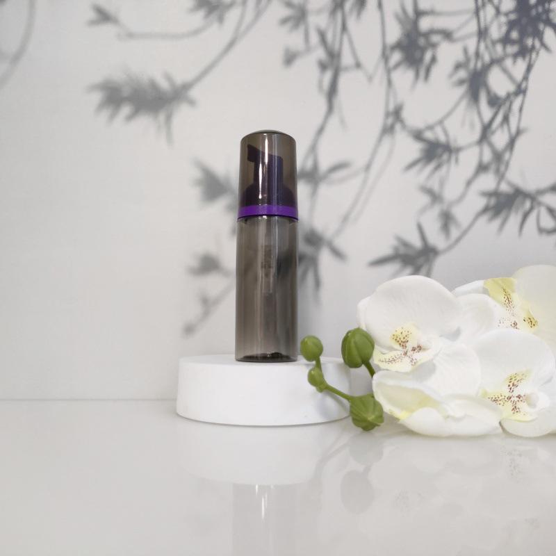 Available 60ml Transparent Black Foam Mousse Bottle for Face Wash and Travel-friendly Cosmetic Packaging.
