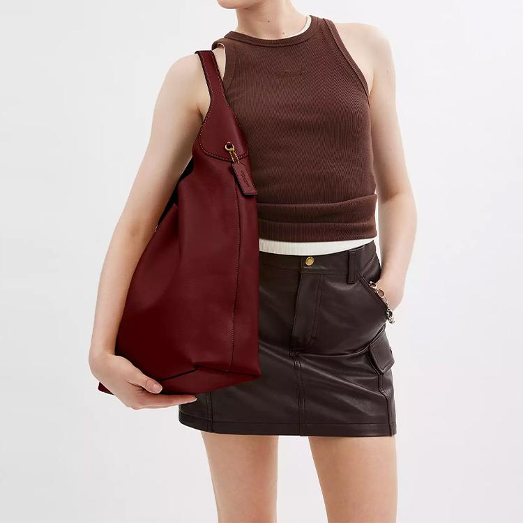 Coach Burgundy Polished Leather Shoulder Hobo Bag with Gold Hardware for Daily Use