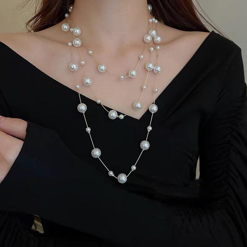 Elegante collar de perlas de imitación de doble capa para mujer, collar de cadena larga.