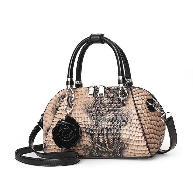 Eine neue Schlangenleder-Muster einfache Crossbody-Schultertasche große Kapazität modische PU-Damenhandtasche