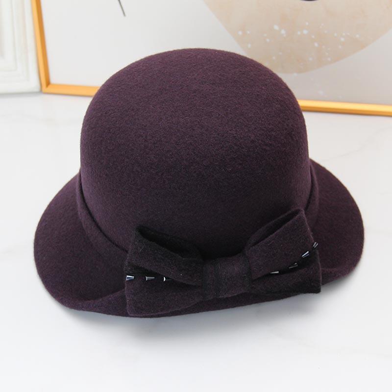 Autumn and winter hat women's thermal basin hat retro round top hat elegant bow fashion wool British fisherman hat