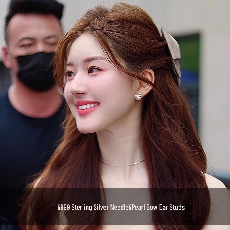 Miss Zhao Lusi s 2025 Silver Pearl Bow Earrings: Luxury Niche Women s Style