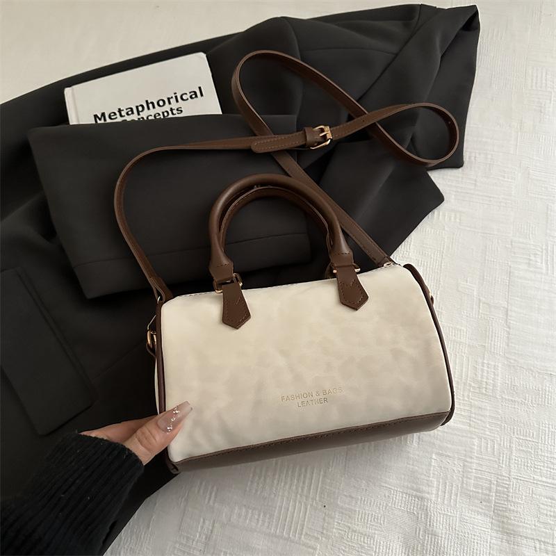 

Autumn new retro shoulder bag, fashionable hot-selling solid color commuter bucket handbag