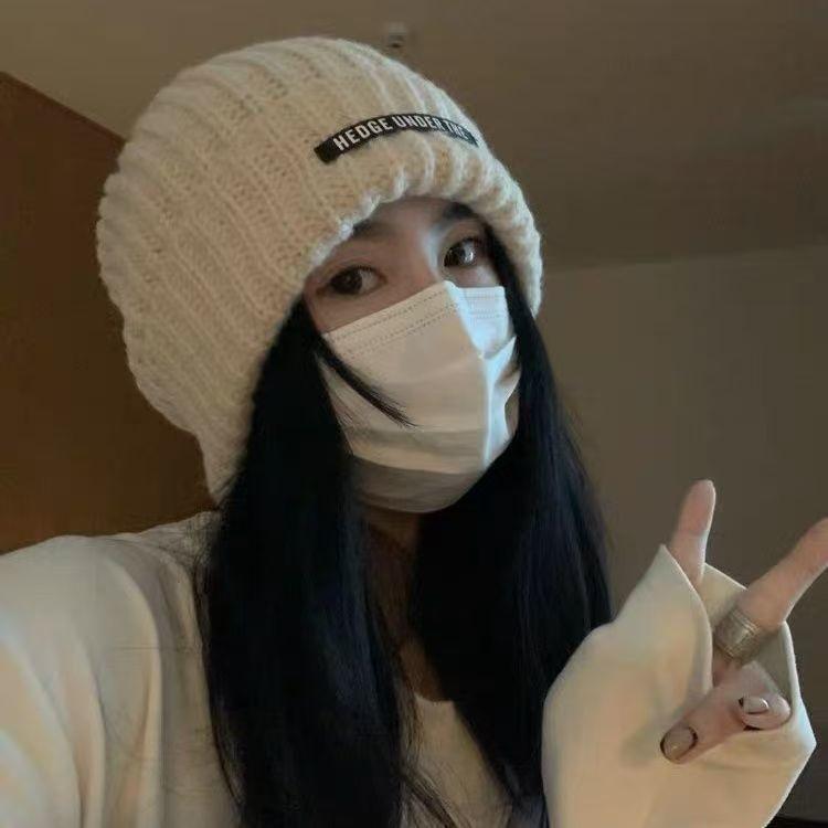 Women's Oversized Wool Beanie: Warm, Stylish, Knitted Hat with Ear Protection for Autumn & Winter.