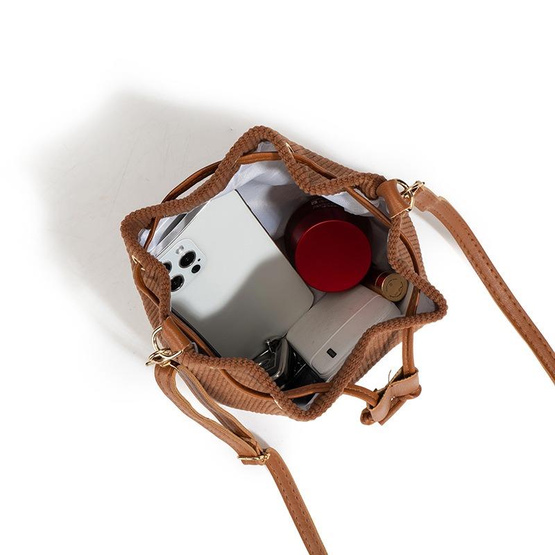 New women's drawstring bucket bag, fashionable commuter bag, trendy shoulder bag, one piece.