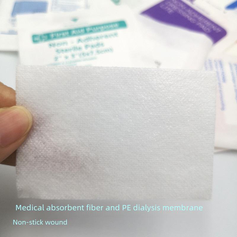 First Aid Kit Accessories: Non-Stick Absorbent Pads and Band-Aids for Wounds