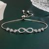 Elegant Silver Infinity Love Bracelet with Diamond Accents - Adjustable and Stylish Women's Hand Jewelry