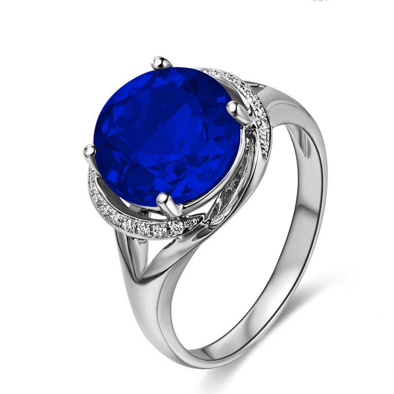 Adjustable Swiss Blue Topaz Ring in 18K Rose Gold Plating - Women's Engagement Jewelry