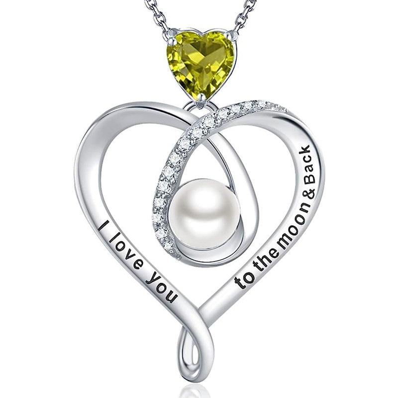 Heart shaped pendant necklace set with yellow zircon and pearls