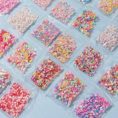 Bunte Perlen und Früchte, Zuckerkörner, weiche Keramik zum Selbermachen, Cremekleber, Handyhüllen, Haarnadeln, Dichtungsmasse, kleine Accessoires.