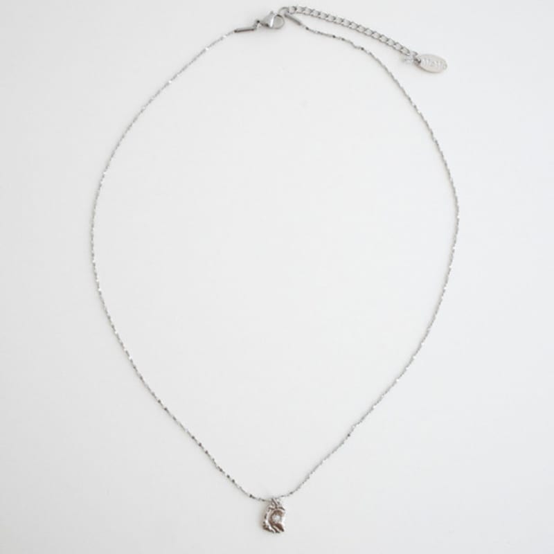 MERRYMOTIVE Fossil Sculpture Pendant Surgical Necklace