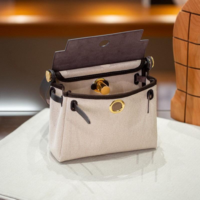 2026 Neue 20cm Rindsleder mit Canvas Leder Tasche Mini Schulter Crossbody Stoff Grenzüberschreitend