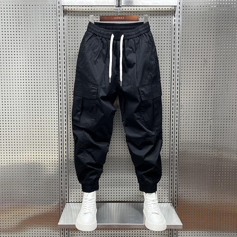 Men's Tapered Quick-Dry Elastic Cargo Pants with Drawstring, Multi-Pocket, Casual Trendy 9-Point Style for Spring and Autumn.
