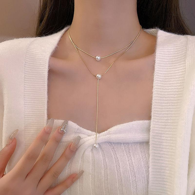 Double-layer pearl collarbone chain Versatile temperament Niche design necklace Female personality Autumn and winter sweater chain