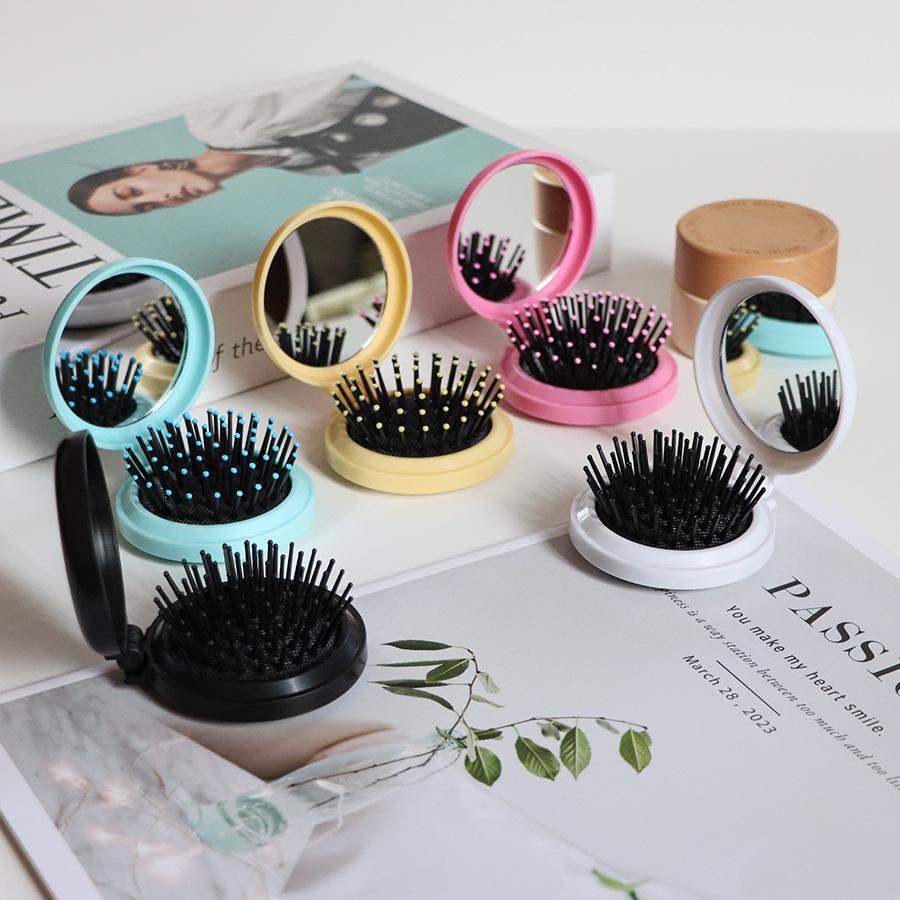 Kompakter Klappkamm & Schminkspiegel mit Airbag-Polster für Kopfmassage