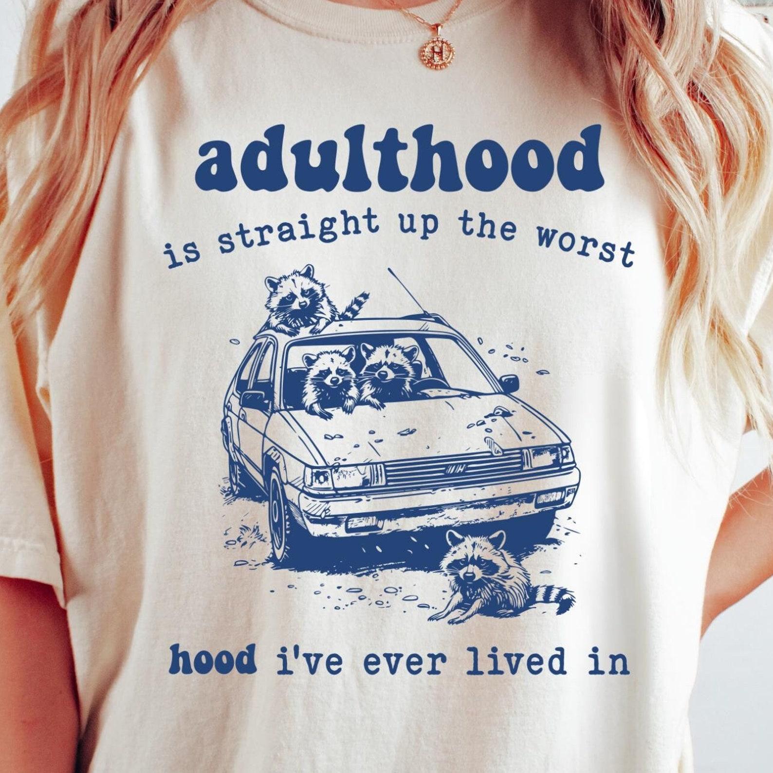 Adulthood Is the Worst Hood I ve Ever Live In Comfort Colors® T-Shirt, Funny Graphic Vintage Retro Raccoon Shirt, Funny Mental Health Shirt S