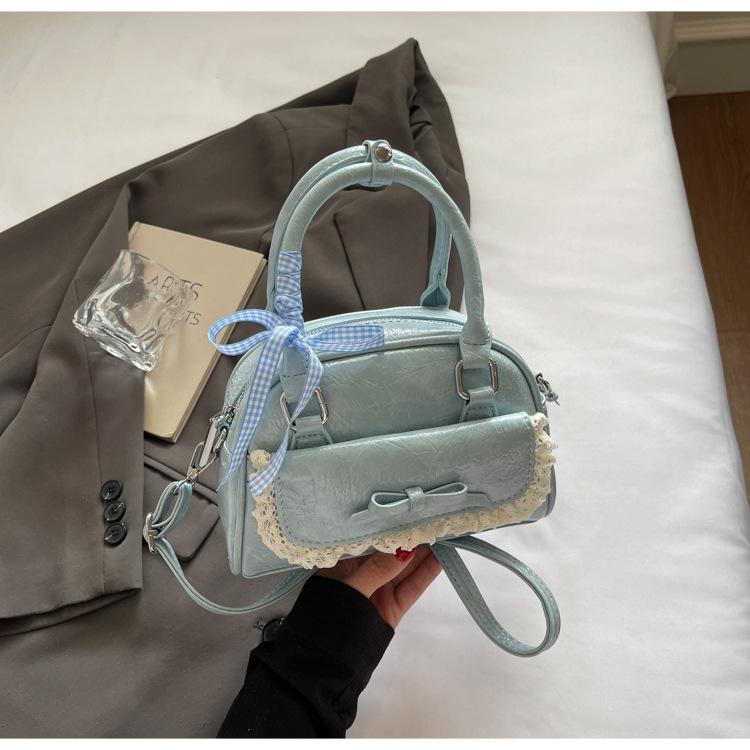 

2025 new niche design bow bag women s high value new versatile messenger bag portable bowling bag синий