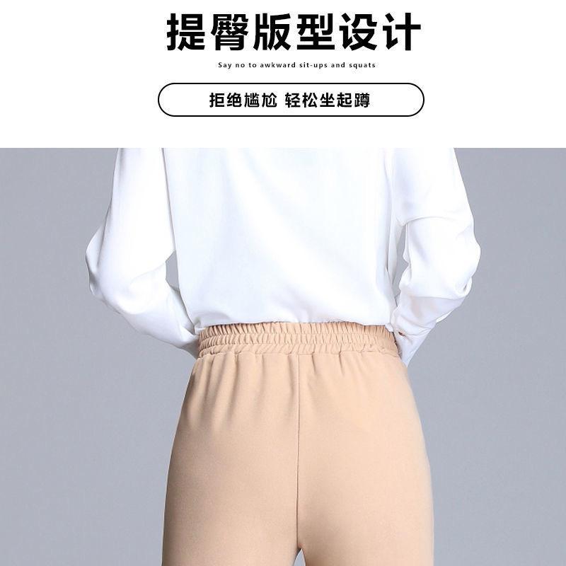 Dámské elastické kalhoty s vysokým pasem a zúženým střihem, ležérní kancelářské bílé kalhoty s detaily přezky