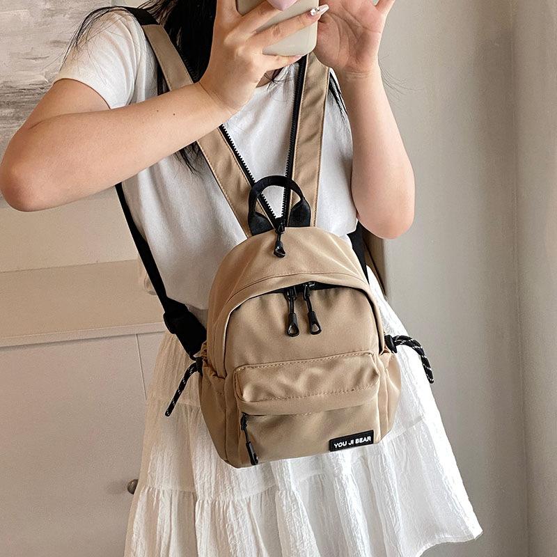 Schoolbag simple and versatile small backpack female niche design ins style schoolbag Korean version single shoulder crossbody student multi-purpose 