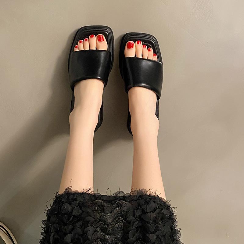 Casual thick-soled one-word drag women's shoes muffin bottom summer wear 2025 new sandals increase the feeling of stepping on shit in shoes